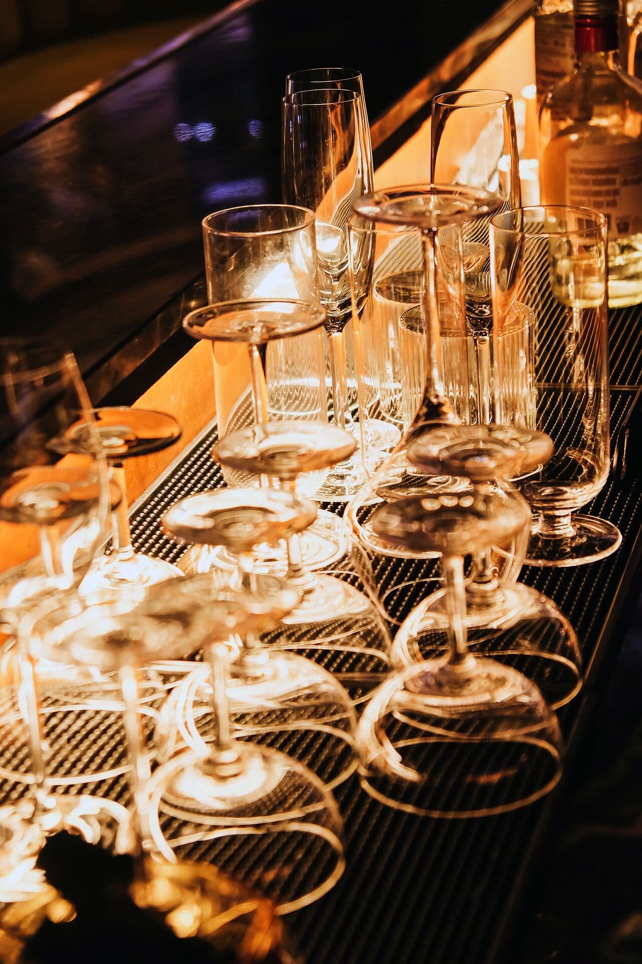 Glassware lined up on the bar